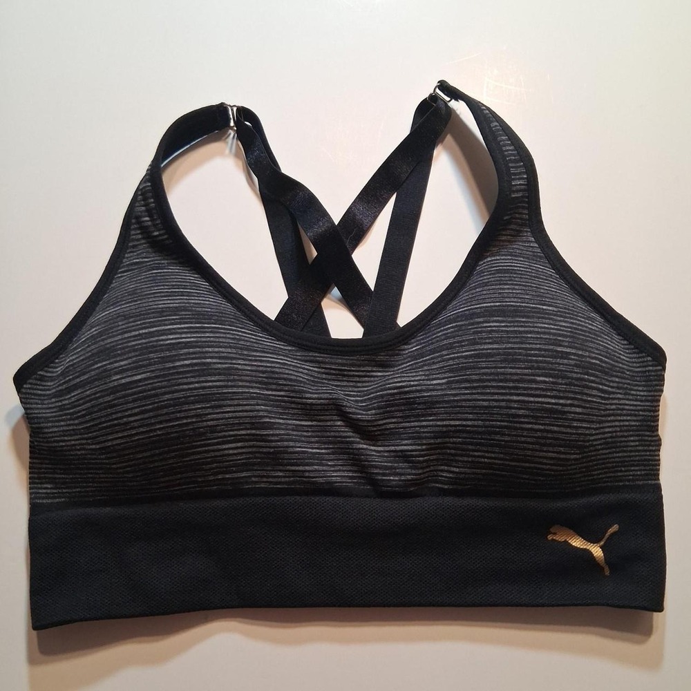 Womens Puma black sports bra with gold‎ logo